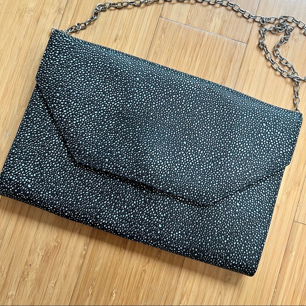 Pebbled black and white crossbody / clutch